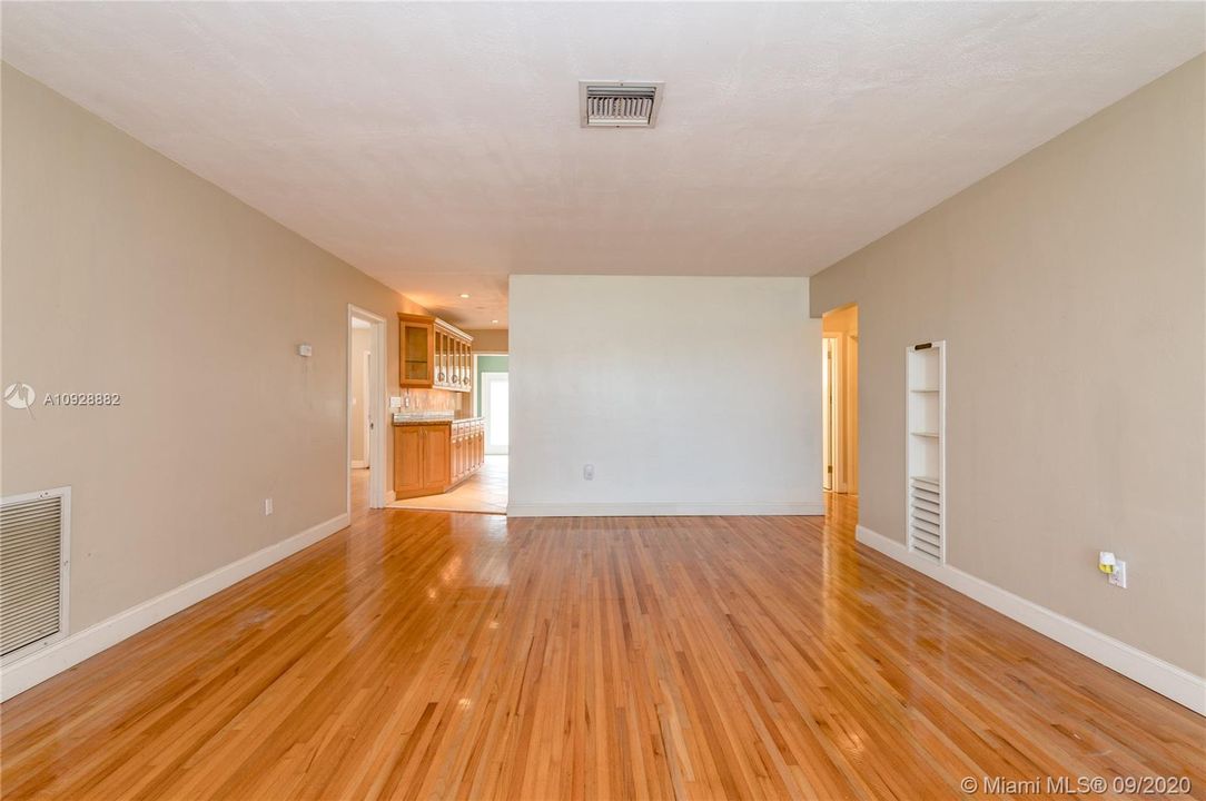 Living - Dining room with view of the kitchen. Master is to the left and 2 bedrooms 1 bath to the right