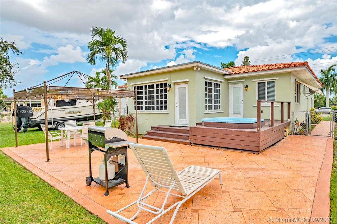 Backyard and hot tub area