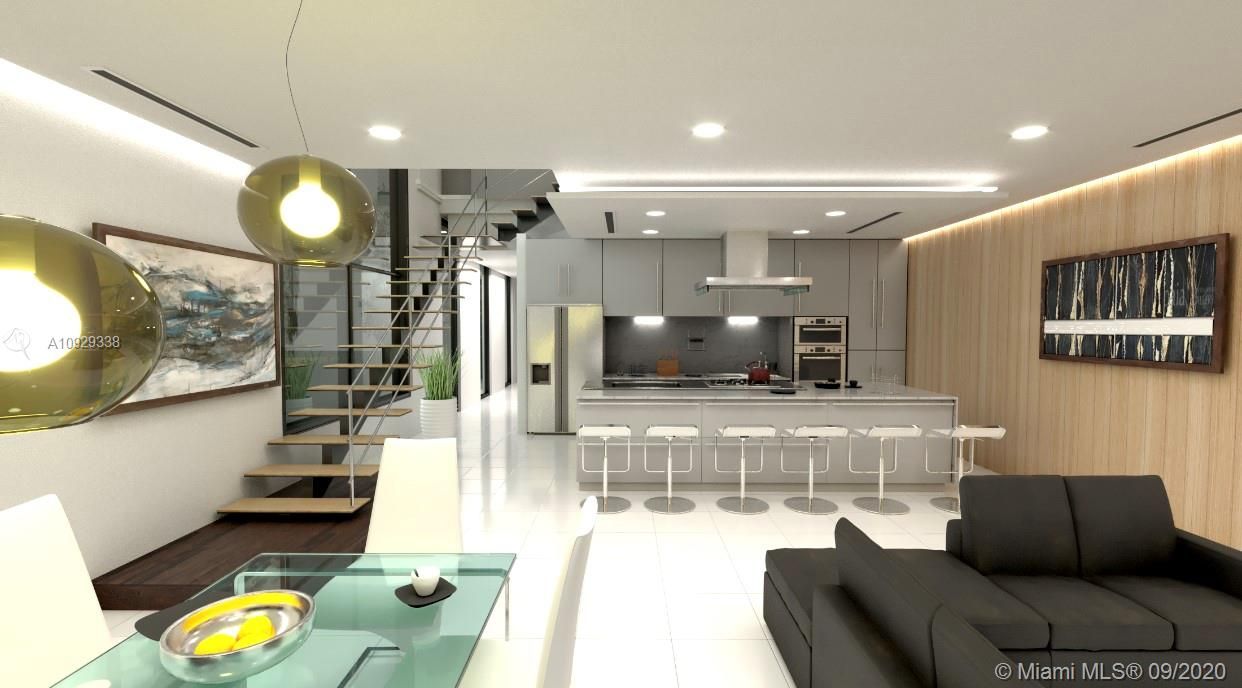 Living room, dining and kitchen. Incredible pen space concept with flow through staircase