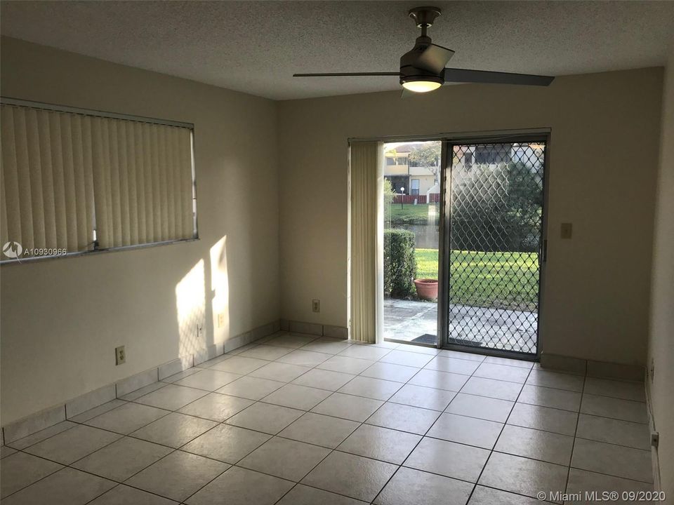 MASTER BEDROOM WITH SLIDING DOOR TO PATIO