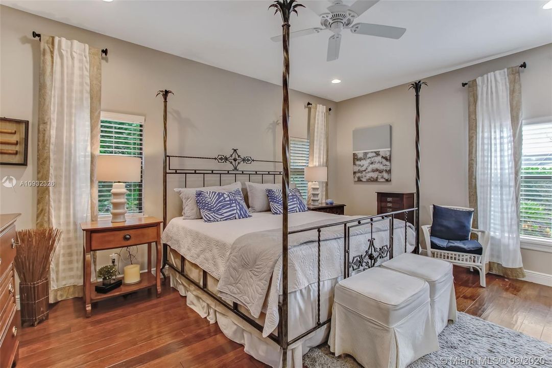 Master bedroom in guest house has a massive walk-in closet with built-in storage.