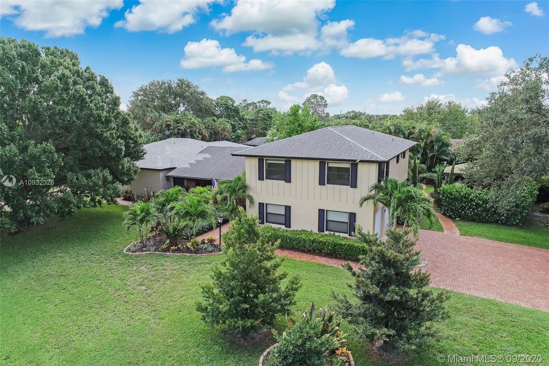 Priceless 75 year old majestic oak tree with two additional mature oak trees in the side yard.  Lush and manicured landscaping throughout the oversized lot.