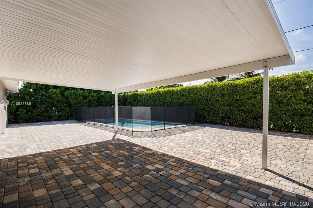Paved backyard great for entertaining and family fun