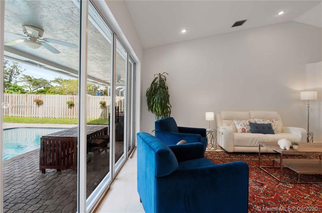 Impressive flow of natural light from the backyard to the living room