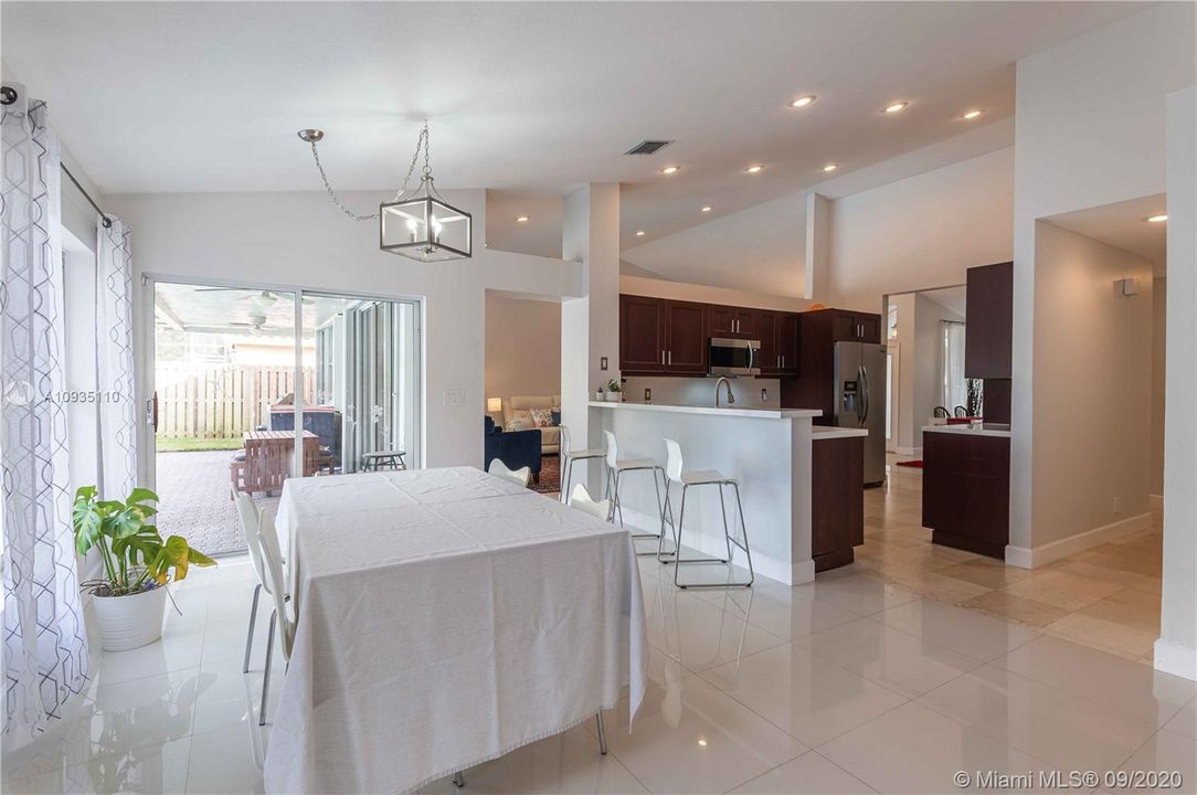 Dining room. Clear windows throughout the space allow the flow of natural light all day long.