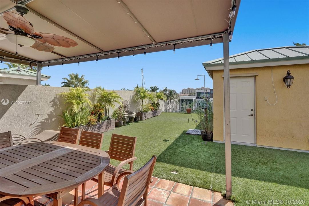 ONE OF TWO SEATING AREAS ON ROOFTOP TERRACE