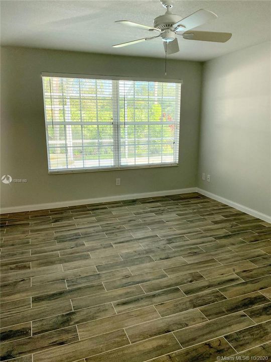 Master bedroom with view to the pool