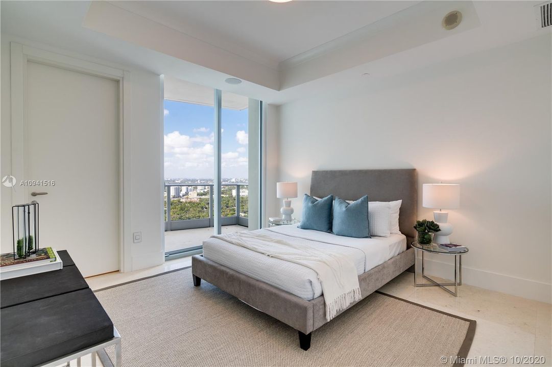 Bedroom with views of the city