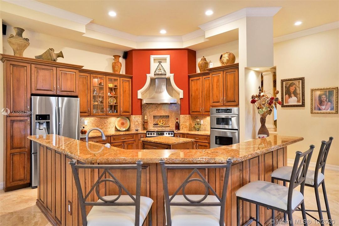 Fully equipped, comfortable open kitchen with ample counter space