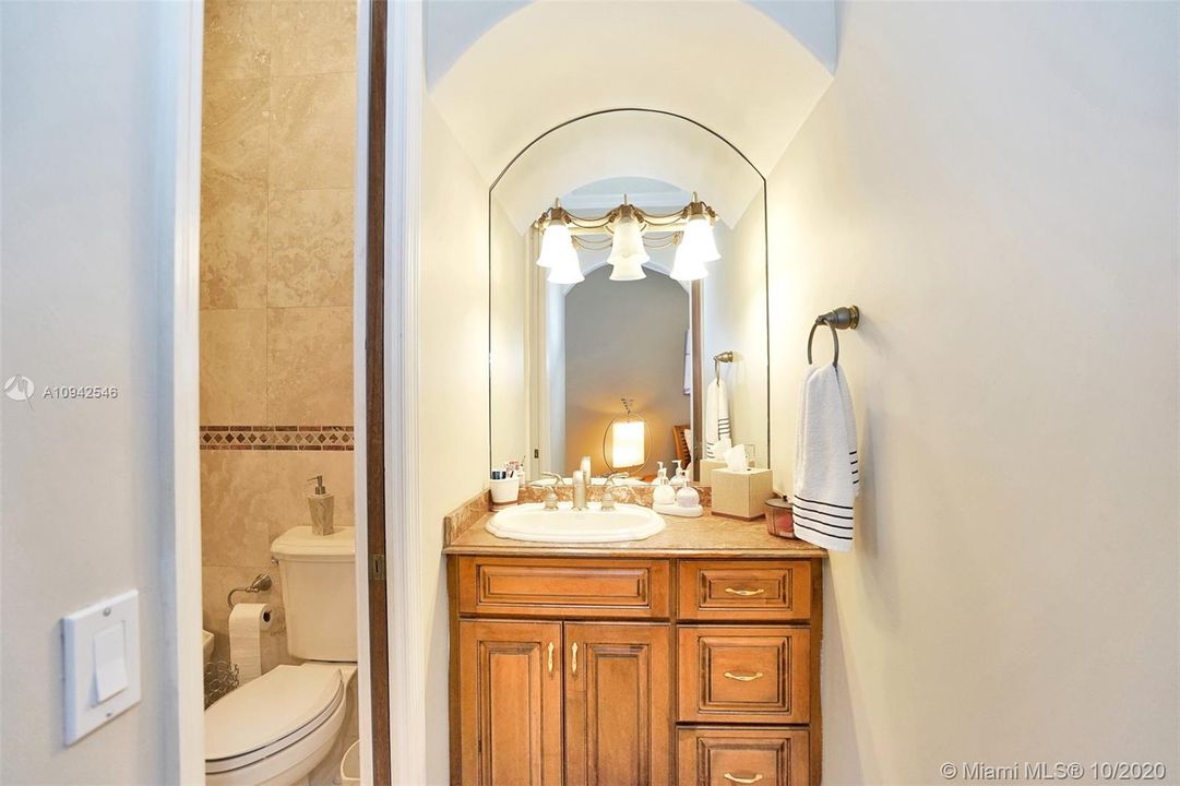 Bathroom #3, Jack-n-Jill shared with bedroom used as gym. Each side has its own vanity area