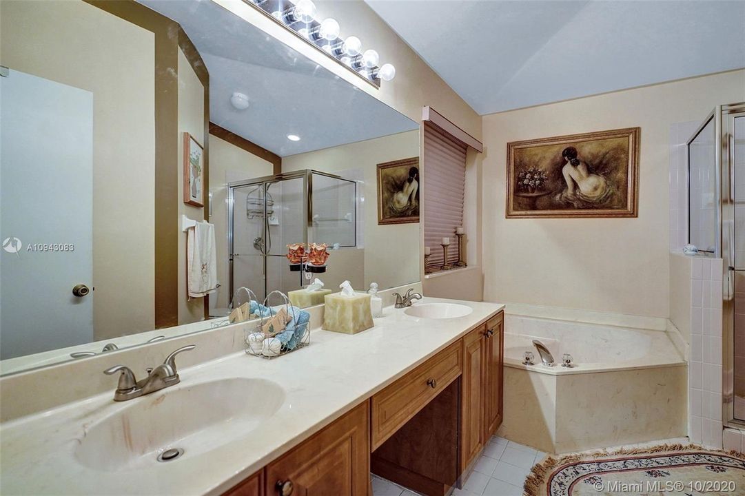 Master Bathroom, ensuite with separate tub and shower, dual sinks and walk-in closet.