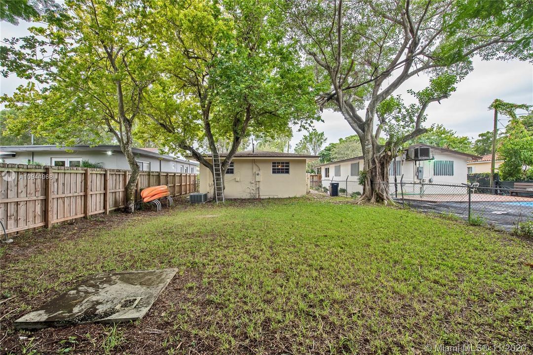 Back yard and view of the home from the end of the yard