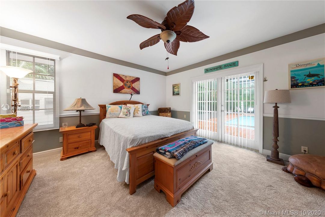 LARGE BEDROOM W/ FRENCH DOORS LEADING TO THE POOL. BEDROOM #2