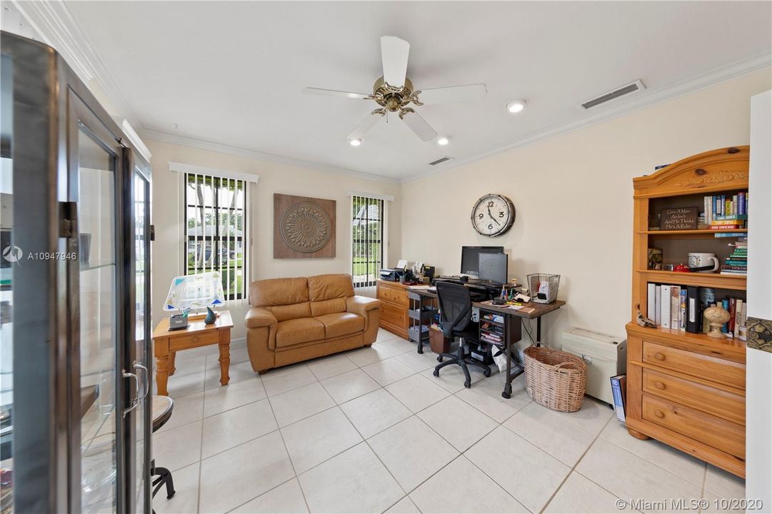 OFFICE W/ FRENCH DOORS OFF OF FAMILY ROOM. COULD BE A FORMAL DINING ROOM.