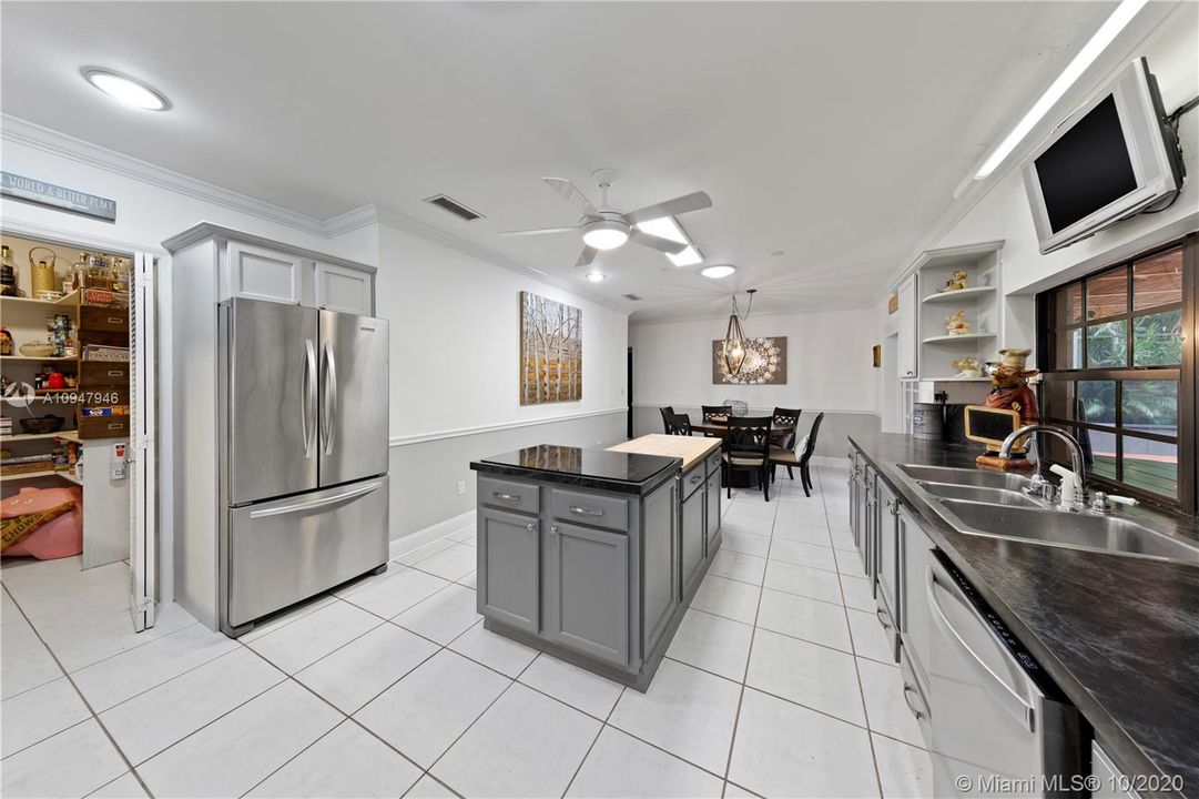 VIEW OF CHEFS KITCHEN LOOKING INTO THE HUGE WALK IN PANTRY.