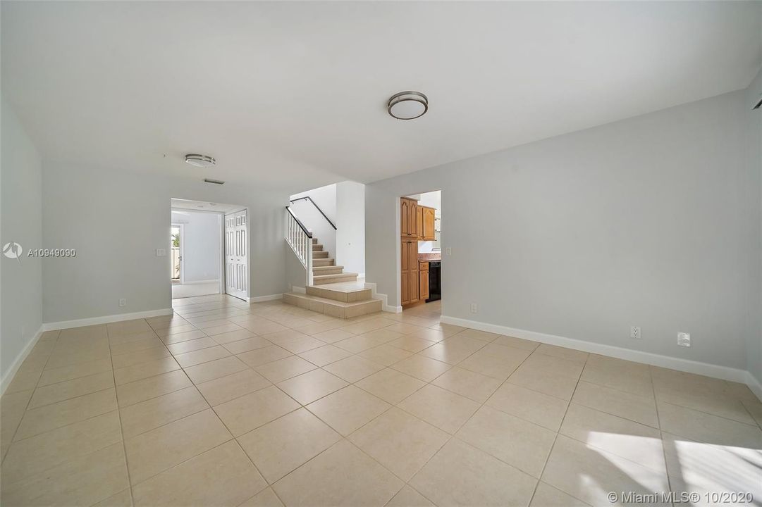 Living Room access to Kitchen, 2nd Floor and 3rd Bedroom