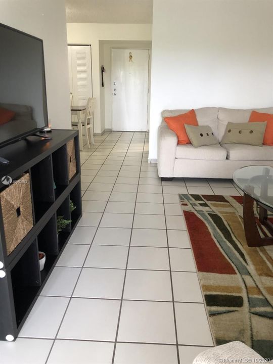 LIVING / DINING AREA & FRONT DOOR