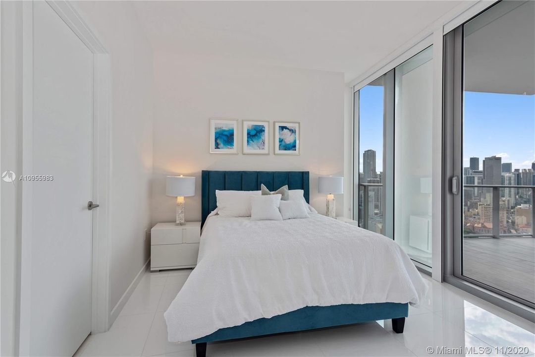 2nd bedroom with en-suite bath and custom closets