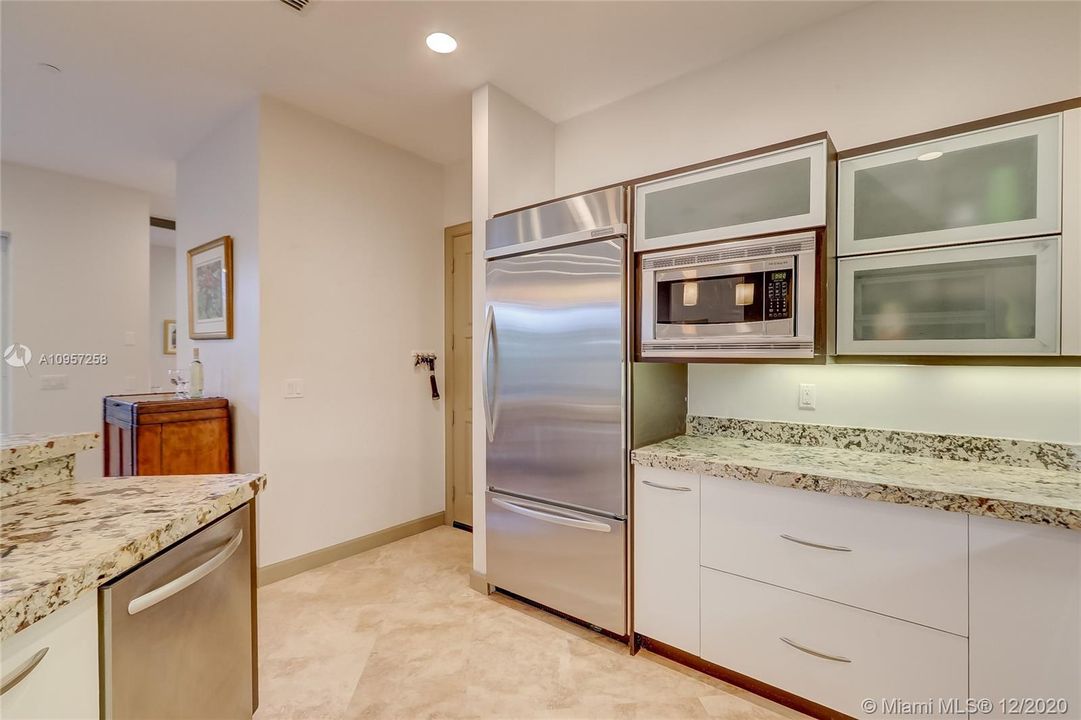 Door to garage, convenient w/ groceries