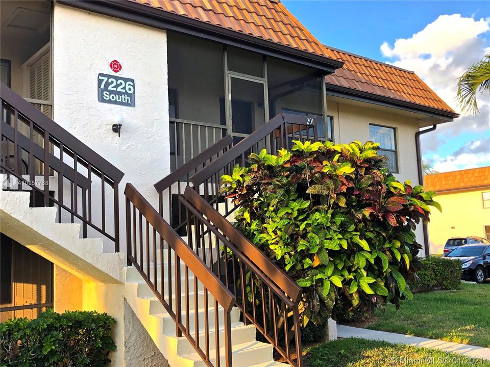 7226 Golf Colony Ct. # 201 - a quiet Oasis with lush green gardens and access to a Golf Course.