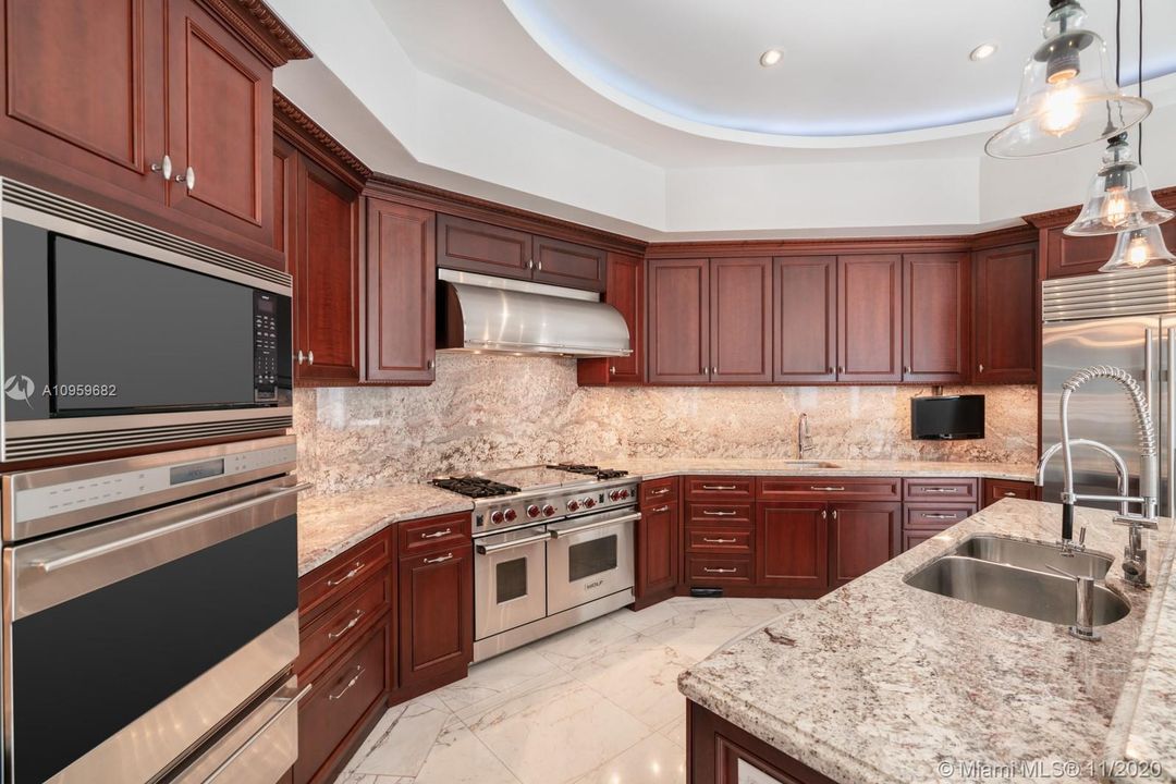 Granite countertops with Stainless Steel appliances.