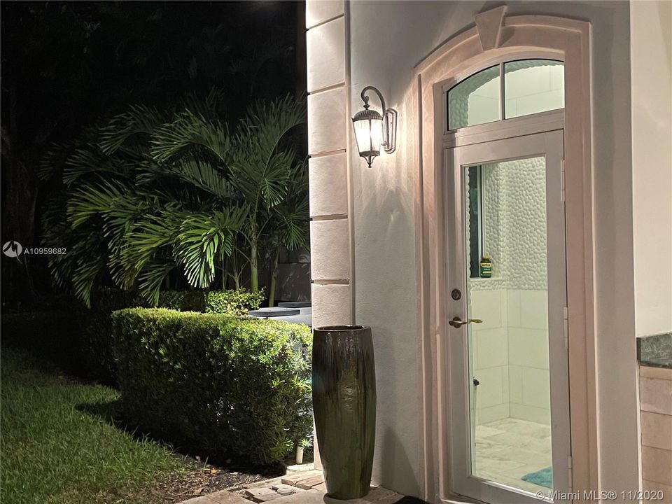 Night View of the Entrance to the Outdoor Full Gazebo Bathroom