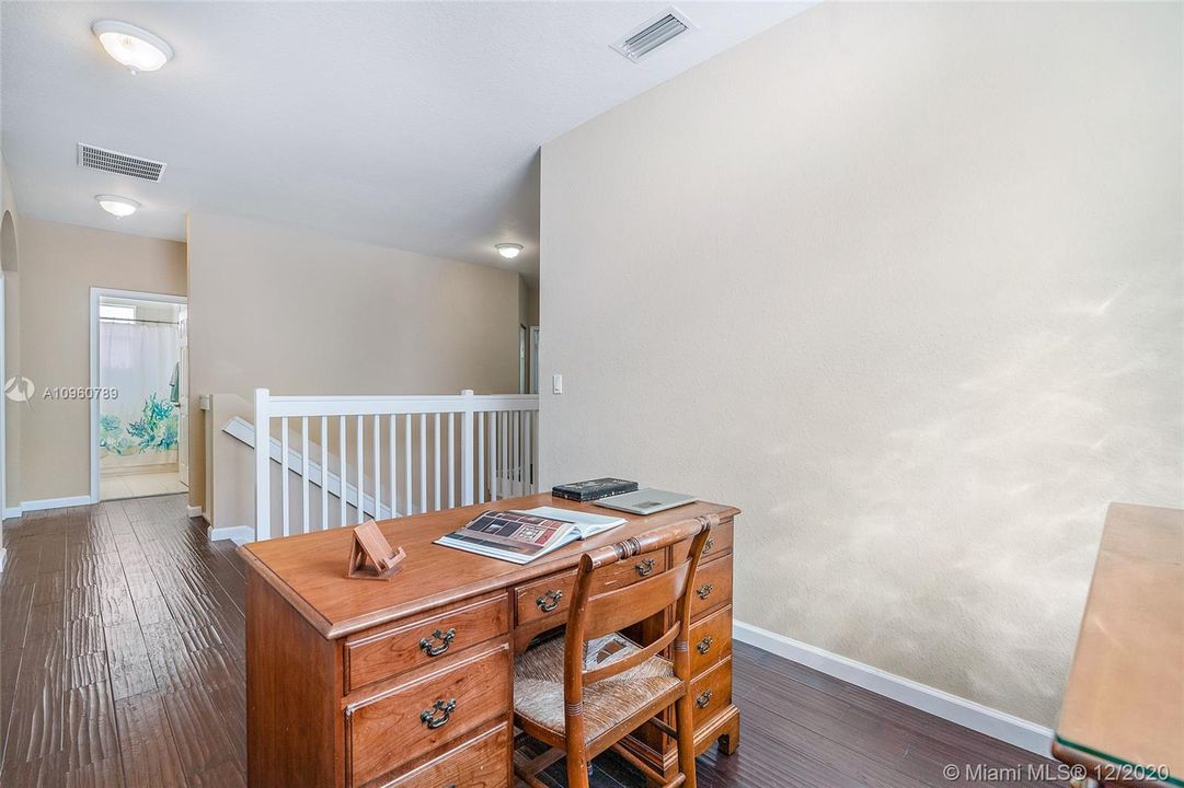 Bonus area -2nd floor loft area approximate 10x8 with wood floors and 9' ceilings.
