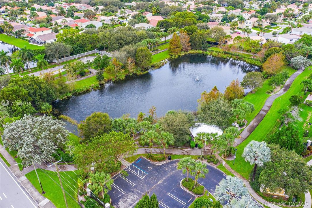 Ariel of Knollwood Park parking lot, walking/running track, fishing pond and gazebo.