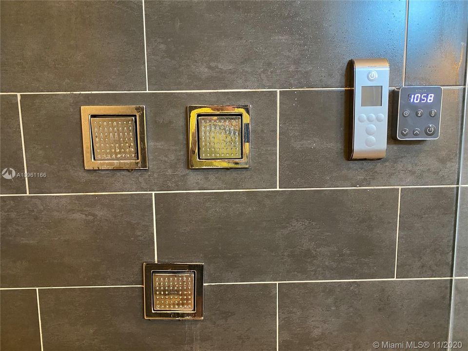 Shower heads with temperature control and spa control.