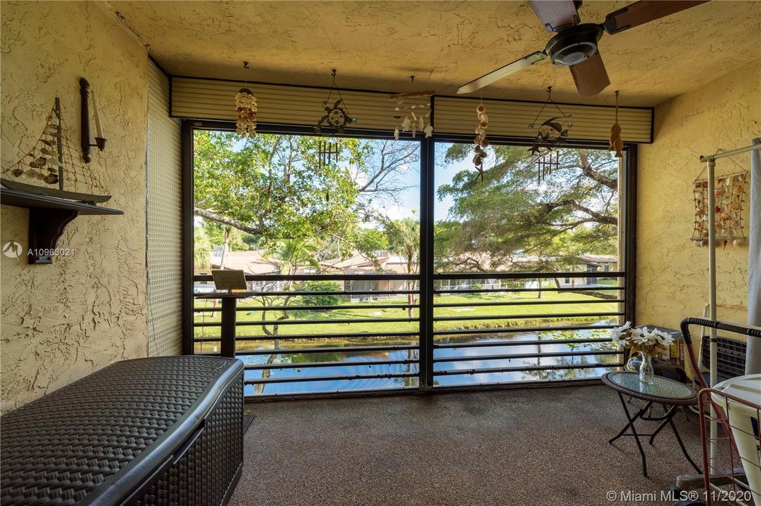 Screened Balcony with Canal View