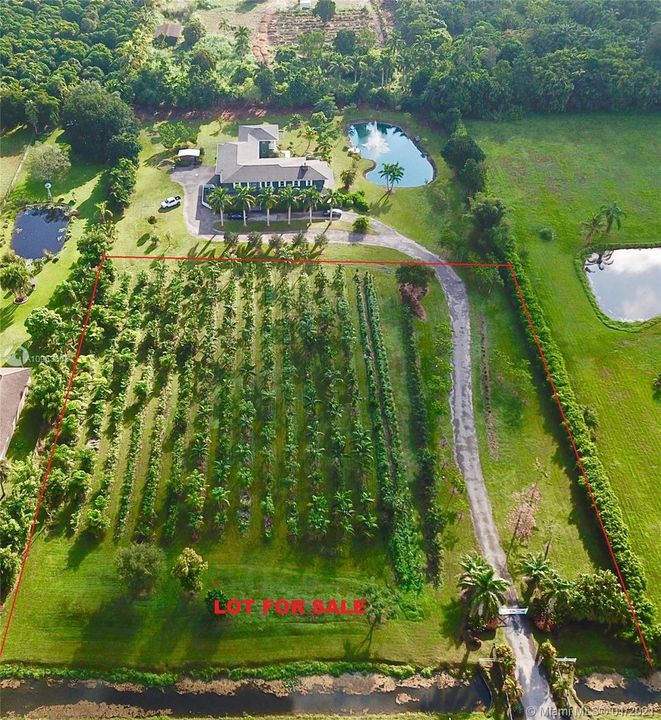2.31 acres.  Trees not included a they belong to a Landscaping Company.
