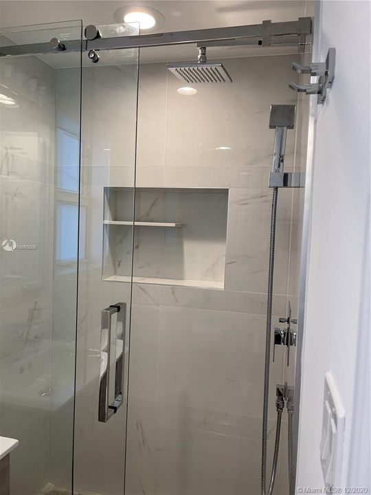 Guest bathroom, glass sliding doors