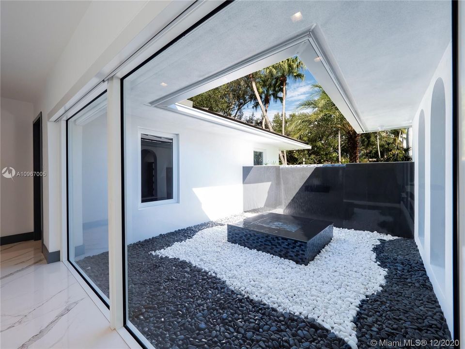 Water feature at interior courtyard.