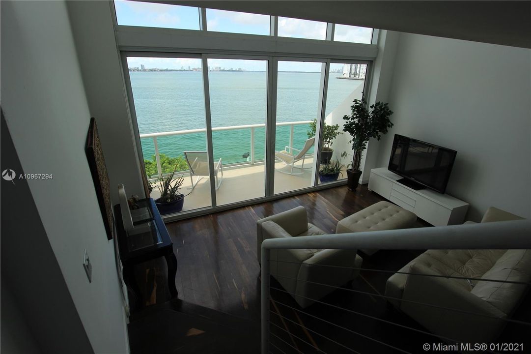 View from the stairs towards living room and terrace.