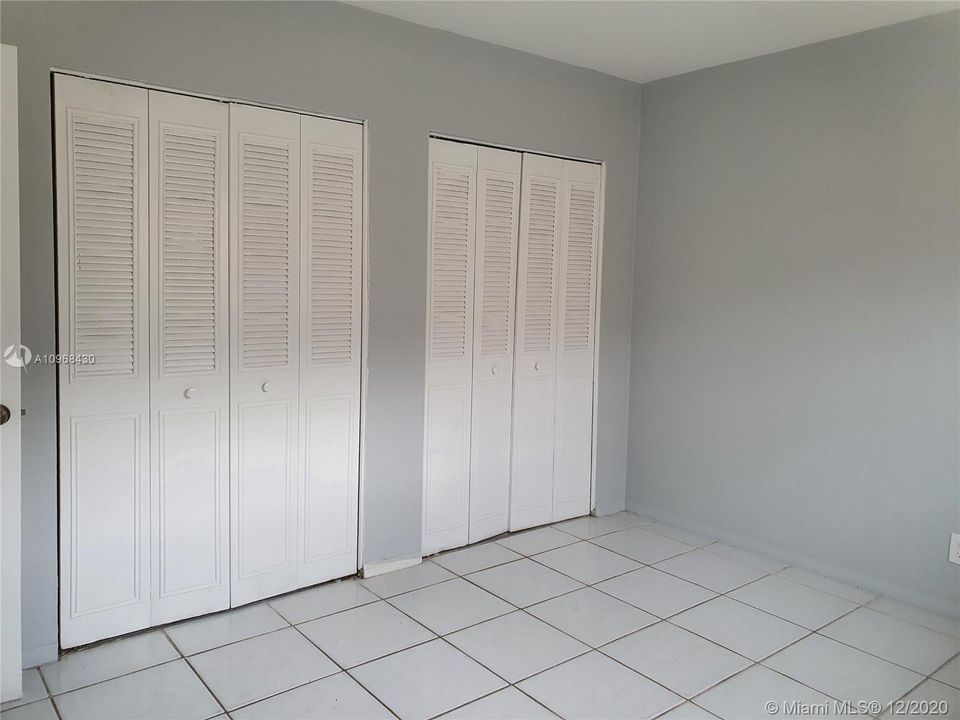 Two large closets in the second bedroom.