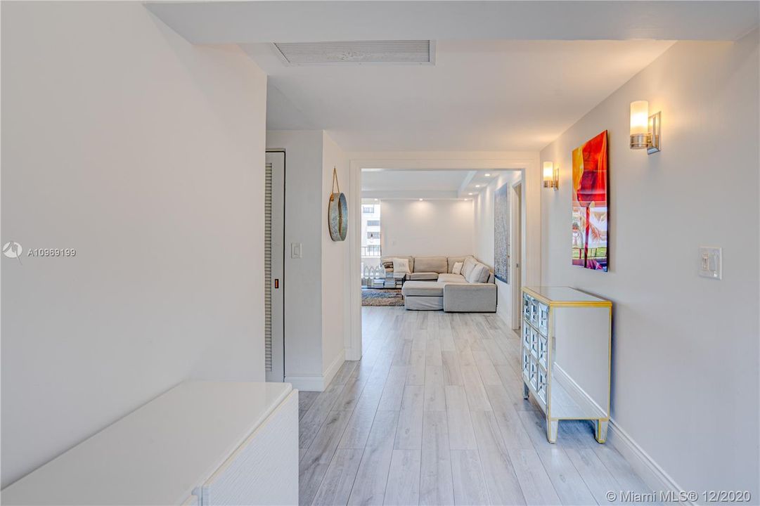 Updated, bright and airy, this unique penthouse features a welcoming entrance.