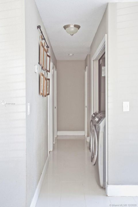 Hallway with laundry area