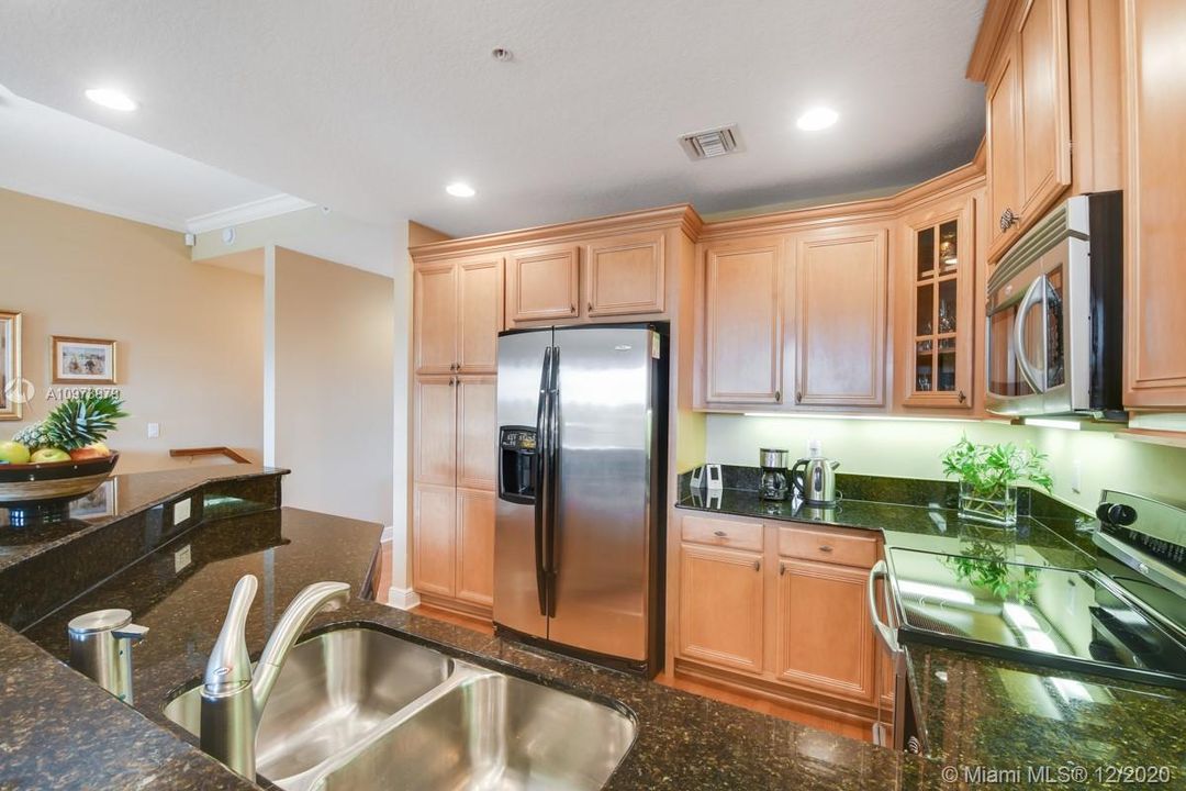 Beautiful kitchen with stainless steel appliances and granite countertops