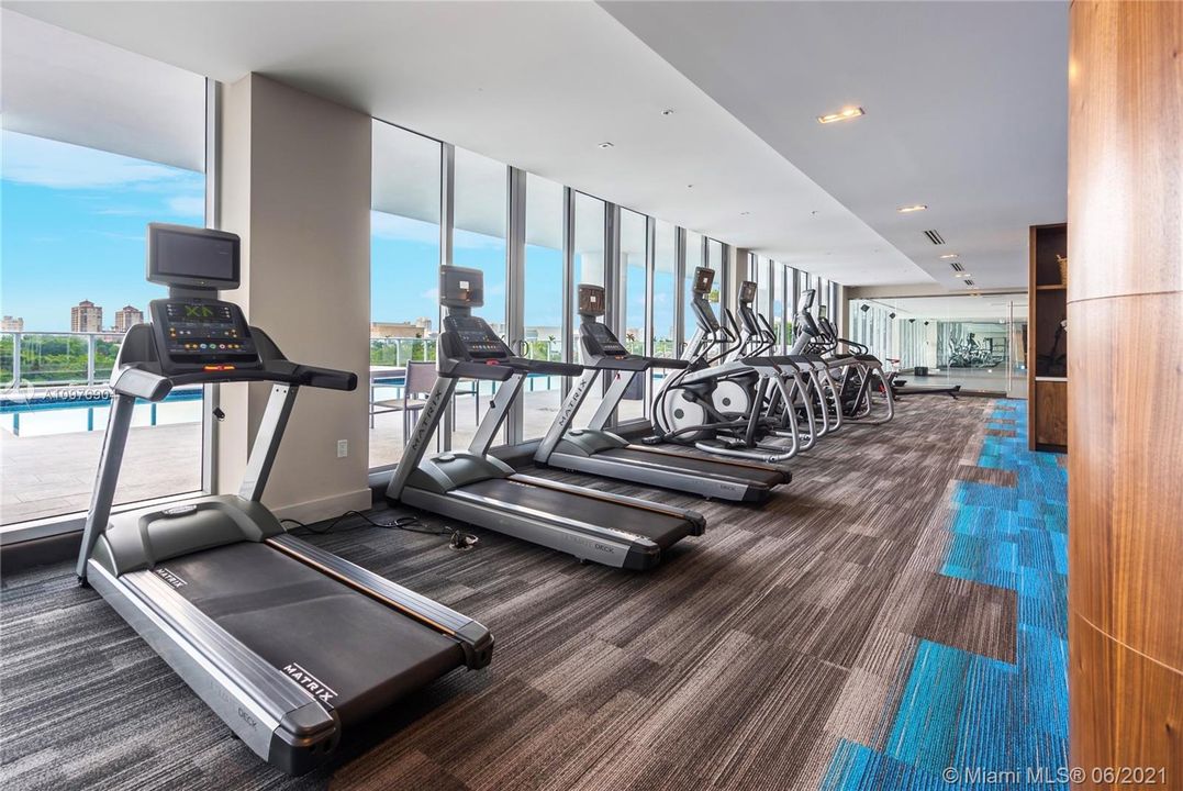 7,000 Sq Ft Gym with Views of the Pool, Middle River & George English Park.