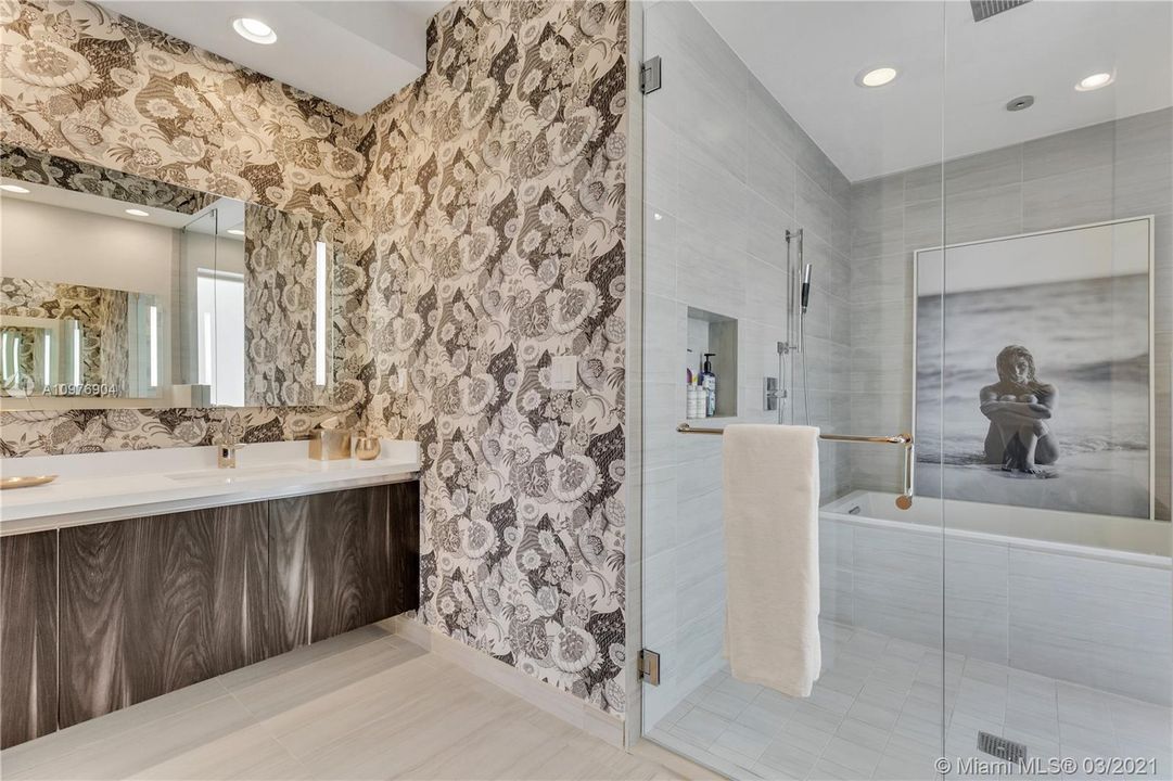 Master Bath with Dual Vanities.  Spacious Glass Enclosed Shower & Tub.