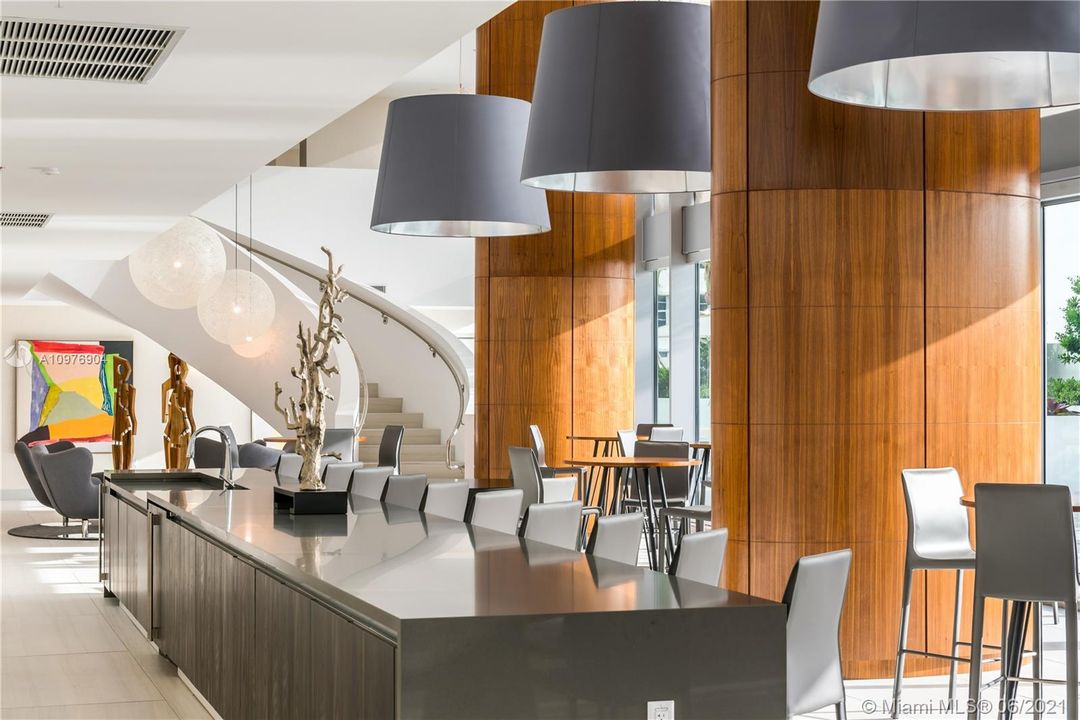 2 Story Resident's Lounge to Entertain, Complete with Bar, Fridge, Sink, Ice-maker, Sonos Sound System, TV's and access to the Sunset Deck.