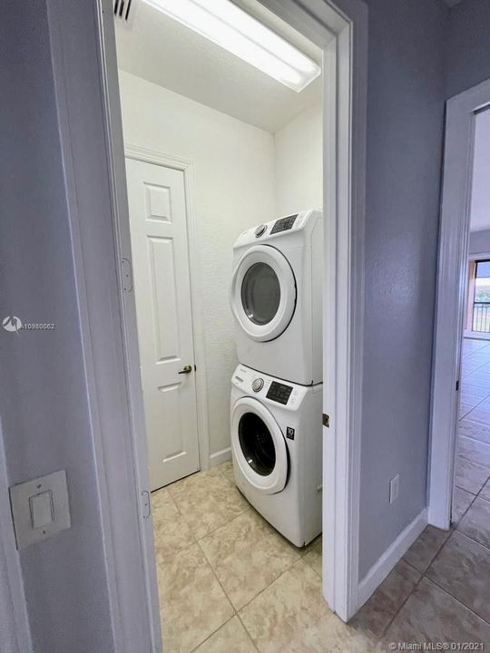 New washer/dryer, laundry room.