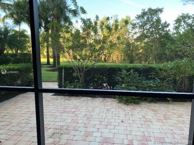 VIEW FROM BALCONY TO PATIO. YOU WALK TO THE LEFT TO FIND OTHER TERRACES, BBQ AND POOL.