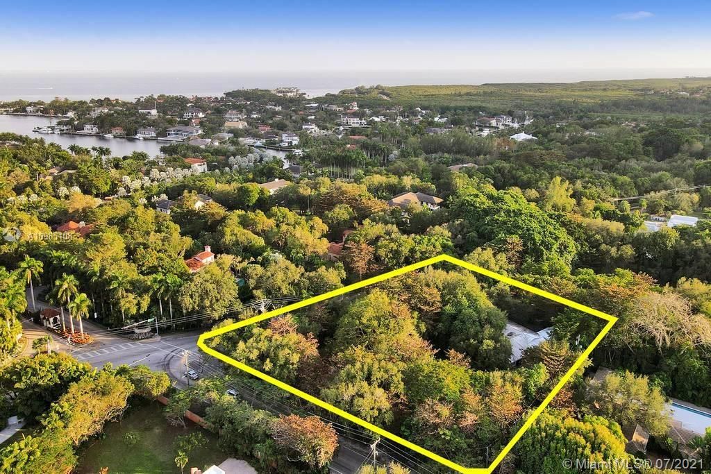 Aerial view of property with views of waterway at Gables Estates