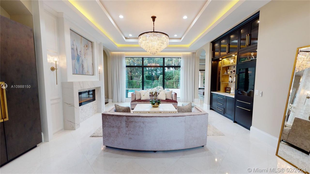 Gorgeous Living Room with Custom Fireplace and Drybar