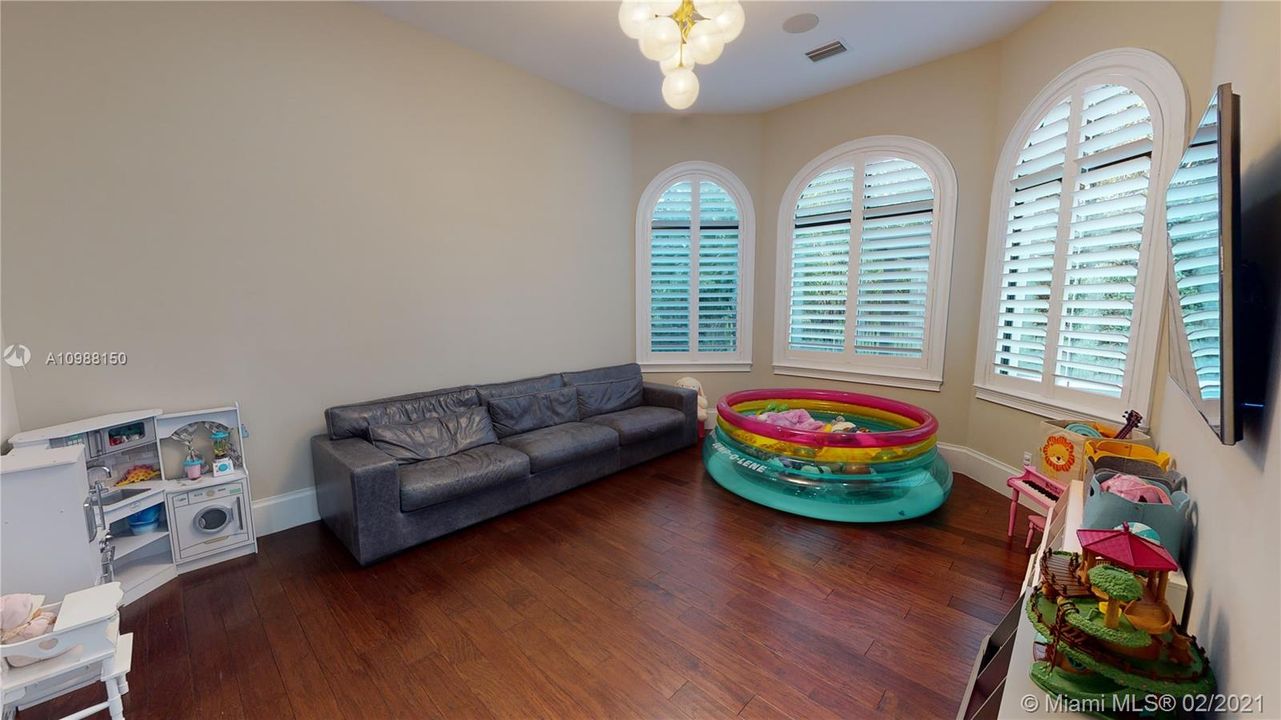 Downstairs Playroom/Bonus Room off Main Living area and Theatre Room