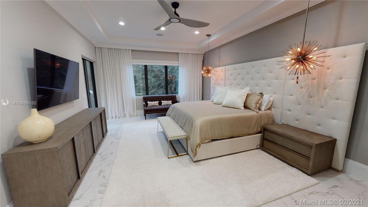 Spacious Master Bedroom with Balcony overlooking Pool/backyard