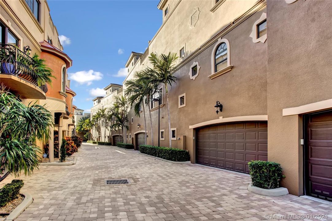 Center of community looks like a slice of Tuscany, 2 car attached garage and walk able to the dock area with gorgeous water and intracoastal views..