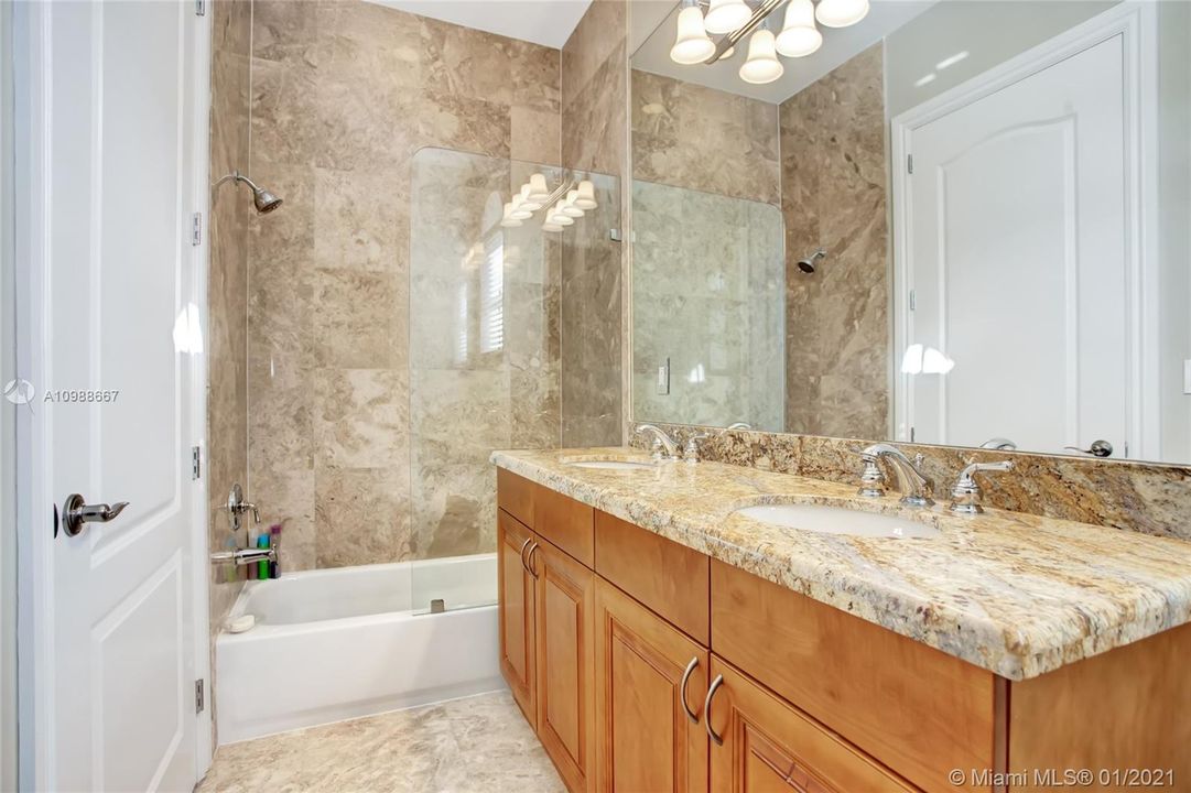 Master bathroom w/ separate tub and other side of the en-suite bathroom has a beautiful glass shower