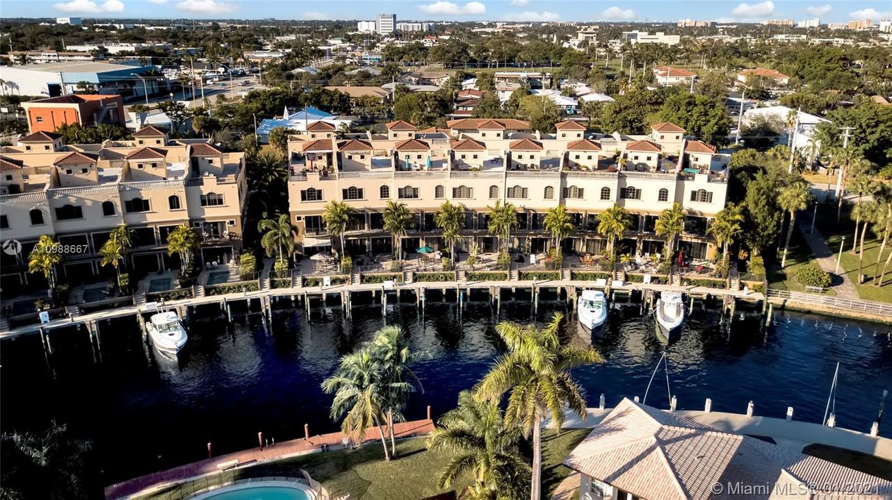 Aerial view of Lake Santa Barbara along with the walking grounds and docks. Located right off Lake Santa Barbara w/ direct access to intracoastal and ocean.